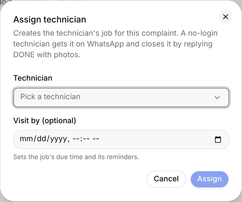The Assign technician dialog with Technician and Visit by fields